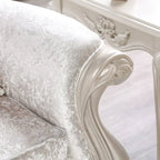 Causeuse 2 places capitonnée traditionnelle | Dossier à oreilles, accoudoirs roulés, tissu fleuri, 71 po l.