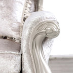 Causeuse 2 places capitonnée traditionnelle | Dossier à oreilles, accoudoirs roulés, tissu fleuri, 71 po l.