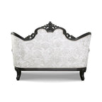 Causeuse 2 places capitonnée traditionnelle | Dossier à oreilles, accoudoirs roulés, tissu fleuri, 71 po l.